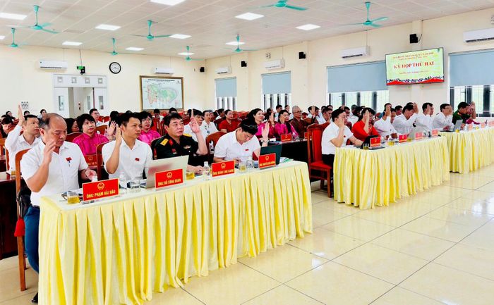 Kỳ họp thông qua nhiều quyết sách quan trọng. Ảnh: Bảo Thoa