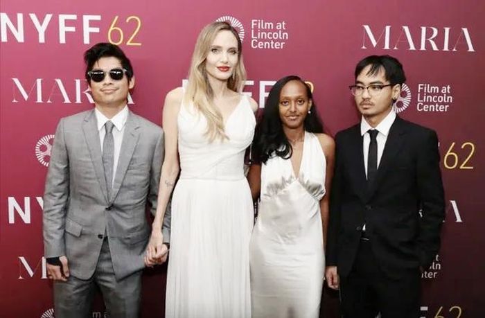 Angelina Jolie bên Pax Thiên, Zahara và Maddox (bìa phải, ảnh chụp năm 2024). Ảnh: AFP.