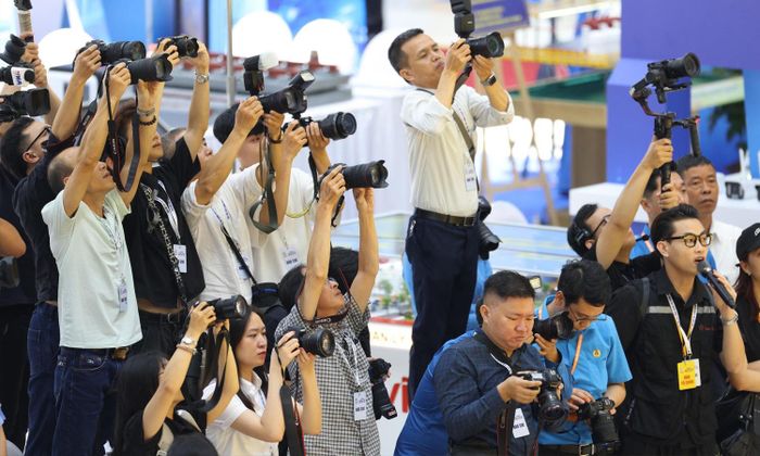 Phóng viên tác nghiệp tại Hội báo toàn quốc năm 2026. (Ảnh: Quang Vinh)