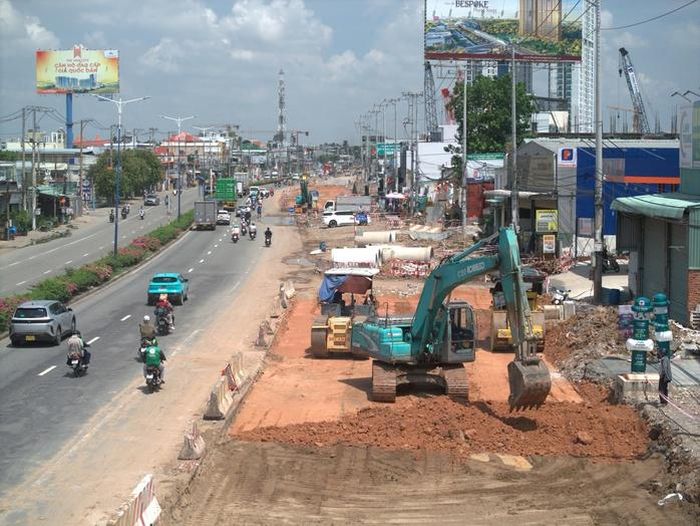 Khẩn trương hoàn thiện các hạng mục cuối cùng trên Quốc lộ 13 để kịp đưa dự án vào khai thác
