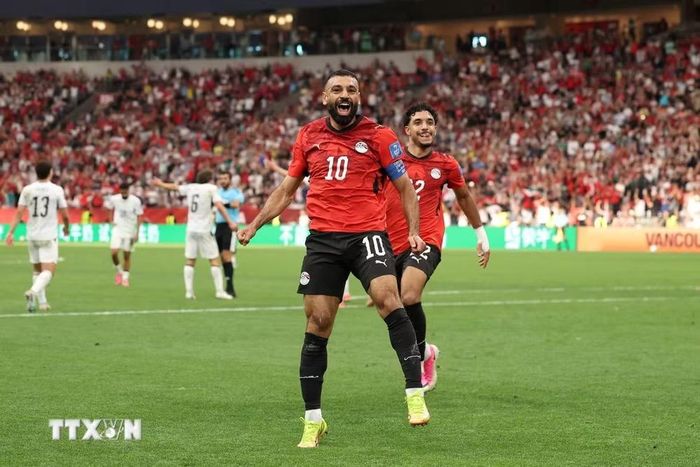 Salah tỏa sáng giúp Ai Cập ngược dòng giành chiến thắng. (Ảnh: AFP/TTXVN)