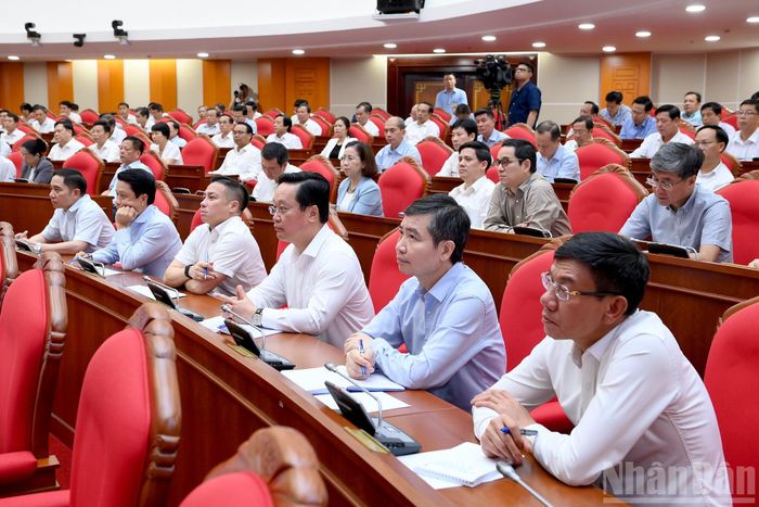 Các đại biểu tham dự tại buổi gặp mặt. Ảnh: NHÂN DÂN