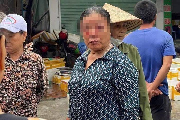 Bà Q. bị tia nước mạnh làm bị thương, chảy máu ở vùng mặt.