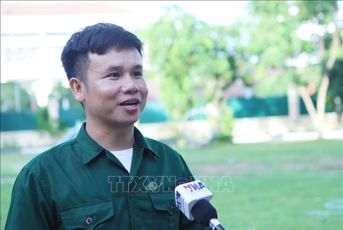 Anh Bounkham Phimmachanh, thí sinh đội Học viện Chính trị Công an Lào trả lời phỏng vấn phóng viên TTXVN. Ảnh: Xuân Tú/PV TTXVN tại Lào