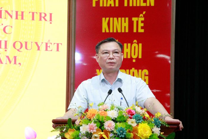 Ông Đặng Văn Cảnh, Bí thư Đảng ủy xã Mỹ Đức, phát biểu tại hội nghị.