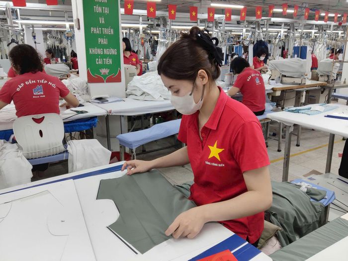 Ngoài sự nỗ lực của doanh nghiệp, ngành dệt may cũng rất cần tháo gỡ khó khăn, vướng mắc Ảnh: Khắc Kiên