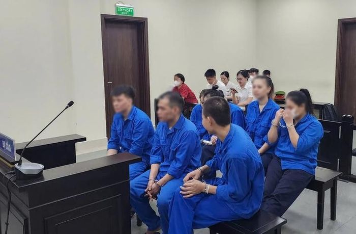 Các bị cáo tại phiên tòa ngày 23/6. Ảnh: M.H