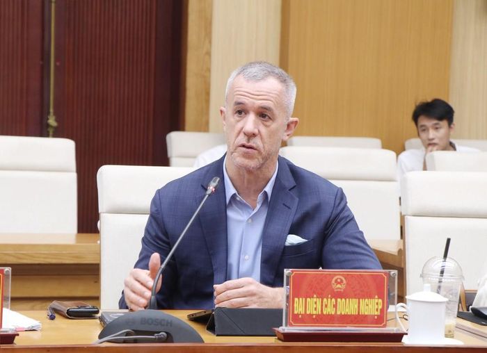 Giám đốc Điều hành Dalberg khu vực Đông Nam Á Christopher Lewis Malone phát biểu tại hội nghị. Ảnh: Thu Hương - TTXVN