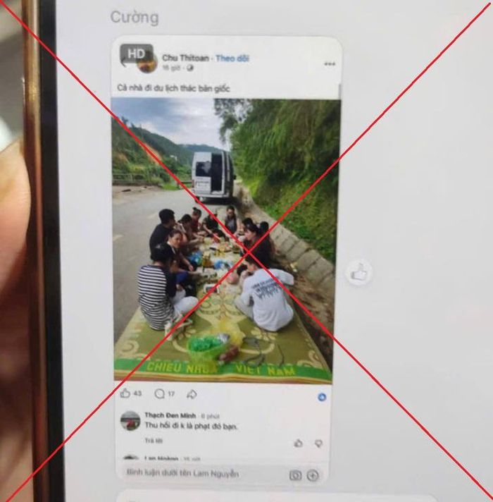Hình ảnh nhóm du khách trải chiếu ngồi ăn uống ngay giữa lòng đường tại khu du lịch thác Bản Giốc. Ảnh: Công an tỉnh Cao Bằng.