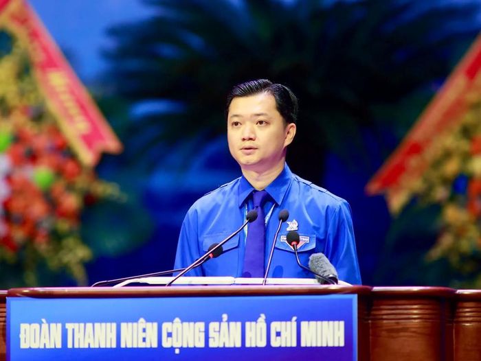 Bí thư thường trực Trung ương Đoàn Nguyễn Minh Triết trình bày tóm tắt Báo cáo chính trị tại Đại hội - Ảnh: TRẦN CƯỜNG