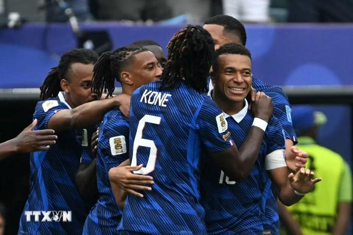 Mbappe thăng hoa để giúp Pháp sớm ghi tên mình vào vòng đấu tiếp theo sau hai chiến thắng. (Ảnh: AFP/TTXVN)