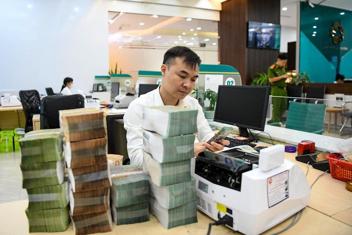Ngân hàng triển khai nhiều giải pháp hỗ trợ doanh nghiệp vừa và nhỏ. Ảnh: Hoàng Anh.