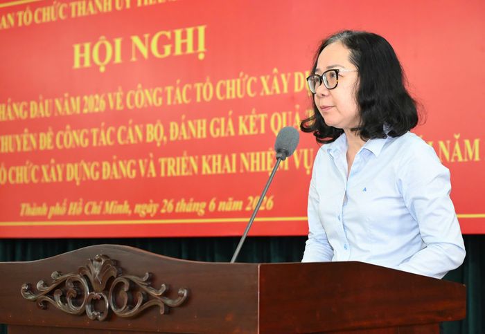  Đồng chí Thái Thị Bích Liên báo cáo. Ảnh: VIỆT DŨNG 