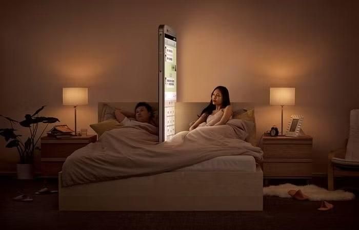 Smartphone cũng đang “bào mòn” mối quan hệ của nhiều cặp vợ chồng. (Ảnh minh họa - Nguồn: boredpanda.com)