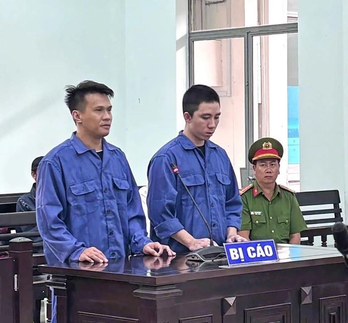 2 bị cáo Thông và Liêm tại phiên tòa.
