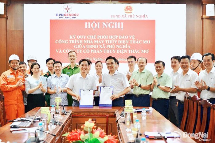 Ngày 7-4-2026 TMP thực hiện ký kết Quy chế phối hợp với UBND xã Phú Nghĩa. Ảnh: Mỹ Phương
