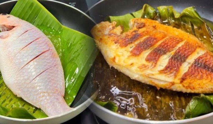 Dùng lá chuối già để chống dính khi rán cá. Ảnh minh họa.