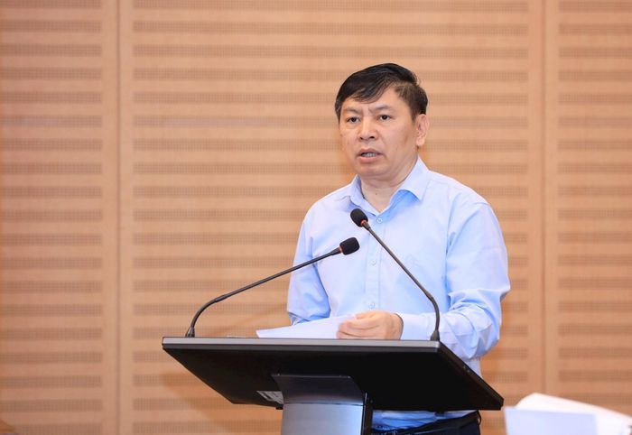 Phó Giám đốc Sở Tư pháp Nguyễn Công Anh trình bày Báo cáo tình hình triển khai thi hành Luật Thủ đô năm 2026. Ảnh: Viết Thành