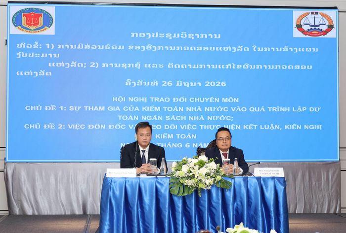 Tổng Kiểm toán nhà nước Việt Nam Nguyễn Hữu Nghĩa và Chủ tịch KTNN Lào Viengthavison Thephachanh đồng chủ trì Hội nghị trao đổi chuyên môn giữa hai cơ quan KTNN. Ảnh: KTNN Lào