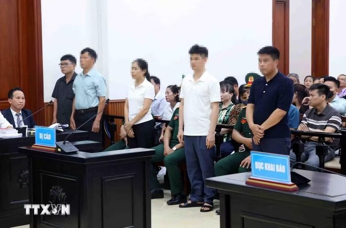 Các bị cáo tại phiên xét xử phúc thẩm. (Ảnh: Phạm Kiên/TTXVN)
