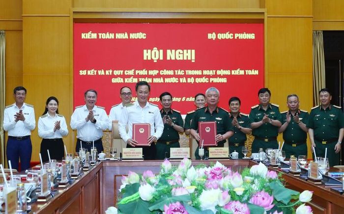 Đại diện hai bên ký Quy chế phối hợp công tác trong hoạt động kiểm toán - Ảnh: VGP/Nguyễn Hoàng