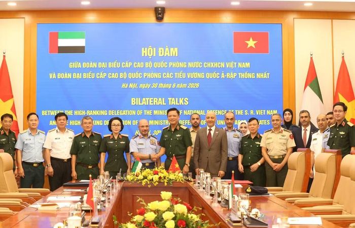 Các đại biểu tham dự hội đàm chụp ảnh lưu niệm. (Ảnh: PV/Vietnam+)