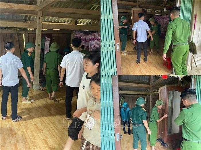 Công an xã Thượng Nông (Tuyên Quang) cùng các lực lượng chức năng hỗ trợ các hộ dân di dời tài sản đến nơi an toàn. Ảnh: TTXVN phát
