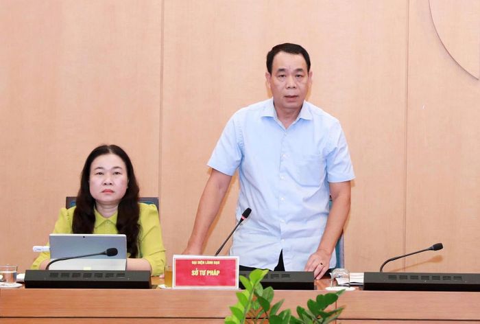 Giám đốc Sở Tư pháp thành phố Hà Nội Ngô Anh Tuấn tham luận tại hội nghị. Ảnh: Hồng Thái