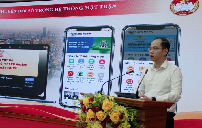 Phó Chủ tịch Ủy ban MTTQ Việt Nam thành phố Hà Nội, Bí thư Thành đoàn Hà Nội Nguyễn Tiến Hưng báo cáo tại hội nghị. Ảnh: Lê Phương