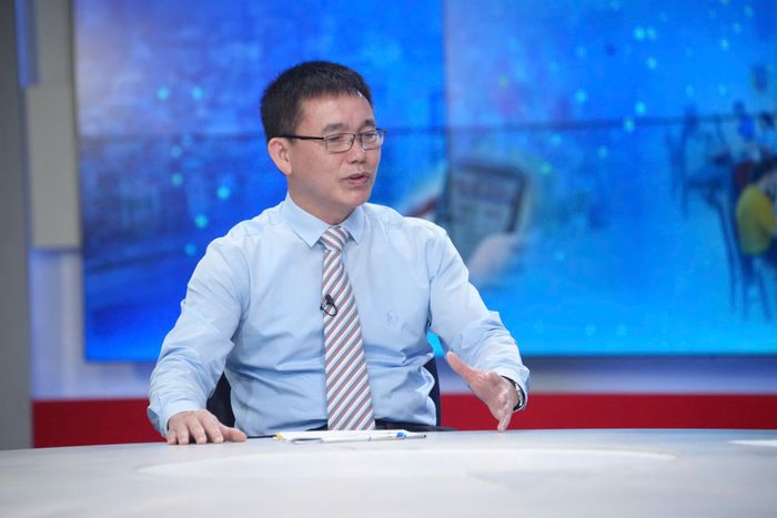 TS Vũ Xuân Thanh, Phó Viện trưởng Viện Khoa học Tổ chức và Lao động (Bộ Nội Vụ) trao đổi tại chương trình. Ảnh: Phạm Hùng