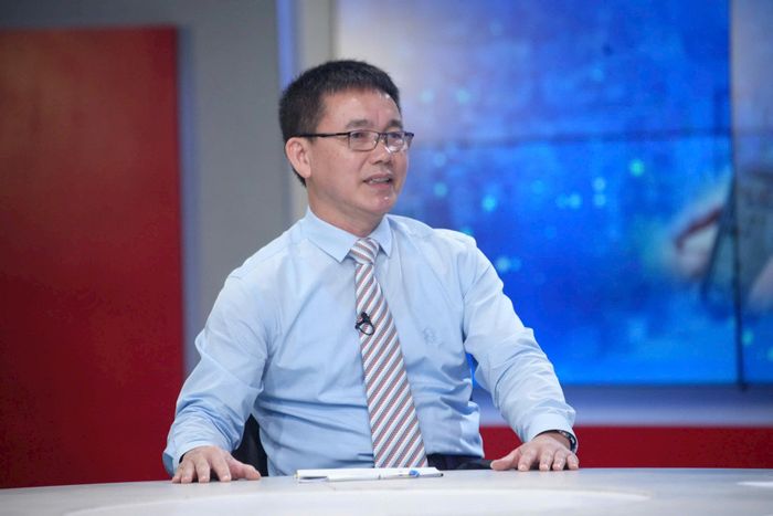 TS Vũ Xuân Thanh, Phó Viện trưởng Viện Khoa học Tổ chức và Lao động (Bộ Nội Vụ) trao đổi tại Chương trình. Ảnh: Phạm Hùng