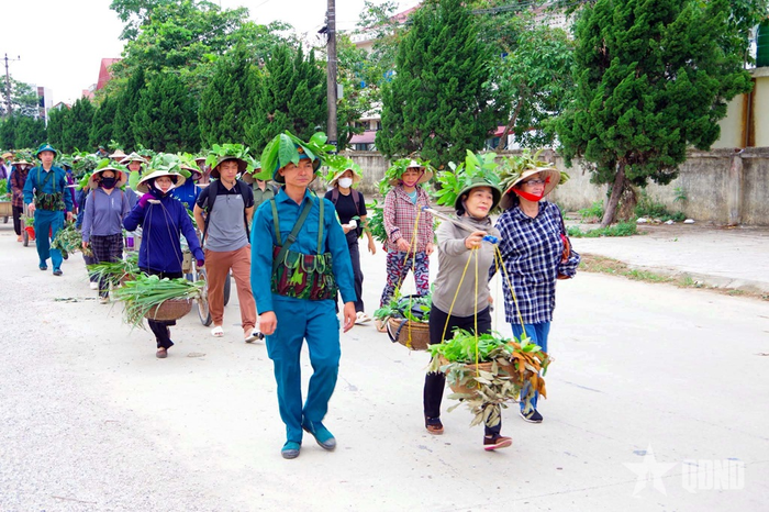 Diễn tập thực binh sơ tán một bộ phận nhân dân khỏi khu vực trọng điểm phòng không tại thôn Đông Thọ xã Nông Cống. 