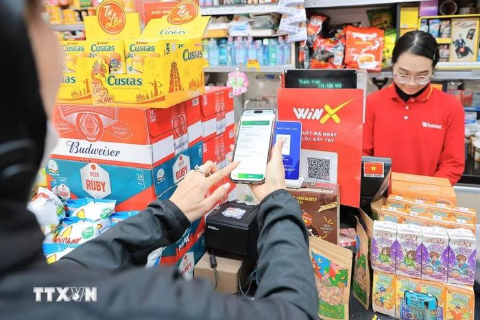 Thanh toán điện tử bằng mã QR. (Ảnh: Lê Đông/TTXVN)