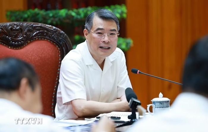 Thủ tướng Lê Minh Hưng chủ trì làm việc với lãnh đạo Bộ Công an và Bộ Khoa học và Công nghệ về xây dựng khung kiến trúc tổng thể quốc gia số. (Ảnh: Dương Giang/TTXVN)