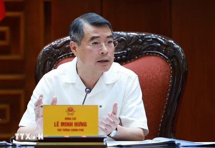 Thủ tướng Lê Minh Hưng chủ trì làm việc với lãnh đạo Bộ Công an và Bộ Khoa học và Công nghệ về xây dựng khung kiến trúc tổng thể quốc gia số. (Ảnh: Dương Giang/TTXVN)