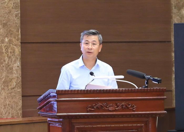 Giám đốc Sở Xây dựng Hà Nội Nguyễn Phi Thường phát biểu tham luận. Ảnh Quang Thái