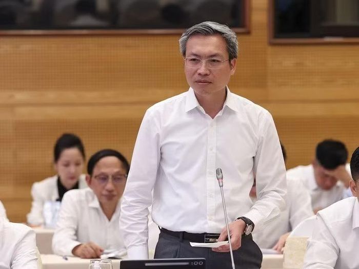 Thiếu tướng Nguyễn Quốc Toản, Chánh Văn phòng, Người phát ngôn Bộ Công an thông tin về công tác đấu tranh với tội phạm lừa đảo 'hợp đồng kỳ nghỉ'. (Ảnh: VGP)