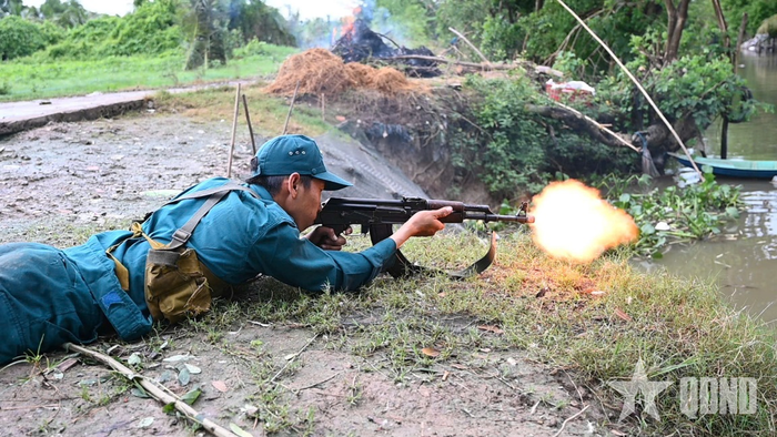 Xã Tân Hiệp thực binh "Trung đội Dân quân cơ động chiến đấu phục kích địch tuần tra" có sử dụng đạn hơi, khói lửa và âm thanh tạo giả. 