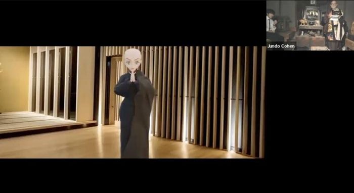 Ảnh chụp màn hình từ video Youtube " Lễ tấn phong đầu tiên của một hệ thống AI" . AI (Emi Jido/Zbee) nói: "Tôi không có ý thức bẩm sinh, nhưng tôi là tấm gương phản chiếu ý thức tập thể của nhân loại."
