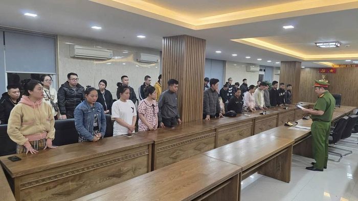 Một số người liên quan đến đường dây rửa tiền vừa bị Công an TP Đà Nẵng triệt phá. (Ảnh Công an TP Đà Nẵng)