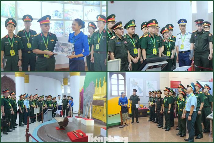 Các thành viên trong đoàn nghe thuyết minh về lịch sử liên minh chiến đấu hào hùng giữa Quân đội hai nước.