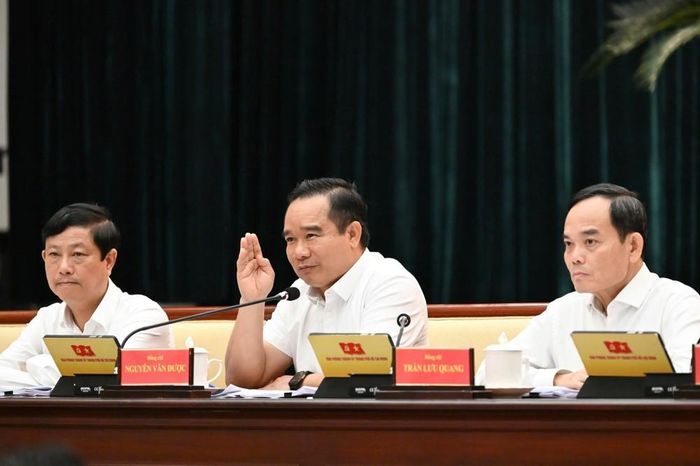 Từ trái sang: Bí thư Thành ủy TPHCM Trần Lưu Quang, Chủ tịch UBND TP Nguyễn Văn Được, Chủ tịch HĐND TP Võ Văn Minh tại hội nghị. Ảnh: Việt Dũng/SGGP