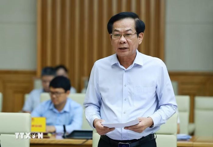 Bộ trưởng Bộ Nội vụ Đỗ Thanh Bình, Phó Chủ tịch Thường trực Hội đồng Thi đua-Khen thưởng Trung ương báo cáo sơ kết công tác thi đua, khen thưởng. (Ảnh: Dương Giang/TTXVN)