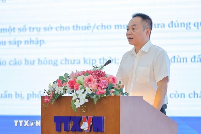 Đồng chí Ngô Thanh Sơn, Chánh Văn phòng TTXVN trình bày tham luận. (Ảnh: Lê Đông/TTXVN)