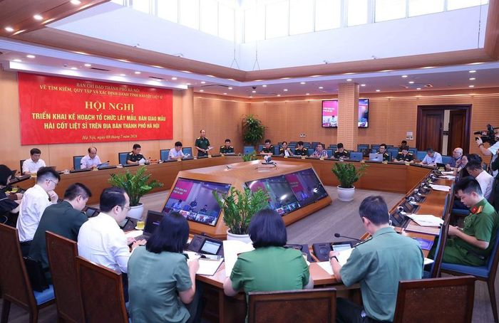 Hội nghị triển khai Kế hoạch lấy mẫu, bàn giao mẫu hài cốt liệt sĩ phục vụ giám định ADN trên địa bàn thành phố Hà Nội. Ảnh: Văn Điệp -–TTXVN
