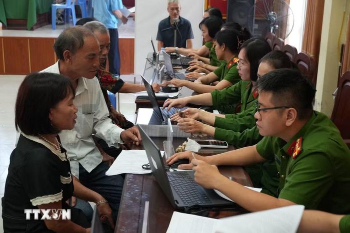 Điểm thu nhận mẫu ADN tại Công an phường Trường Vinh. (Ảnh: Bích Huệ/TTXVN)