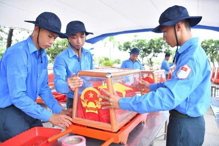 Chuẩn bị nghi thức an táng các hài cốt liệt sĩ tại Nghĩa trang Dốc Bà Đắc - Ảnh: VGP/QK9