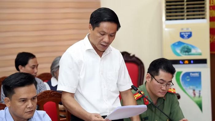Đồng chí Hoàng Minh Cảnh, Phó Giám đốc Sở Giáo dục và Đào tạo tỉnh Tuyên Quang báo cáo về công tác tổ chức kỳ thi tốt nghiệp trung học phổ thông năm 2026 tại tỉnh Tuyên Quang.