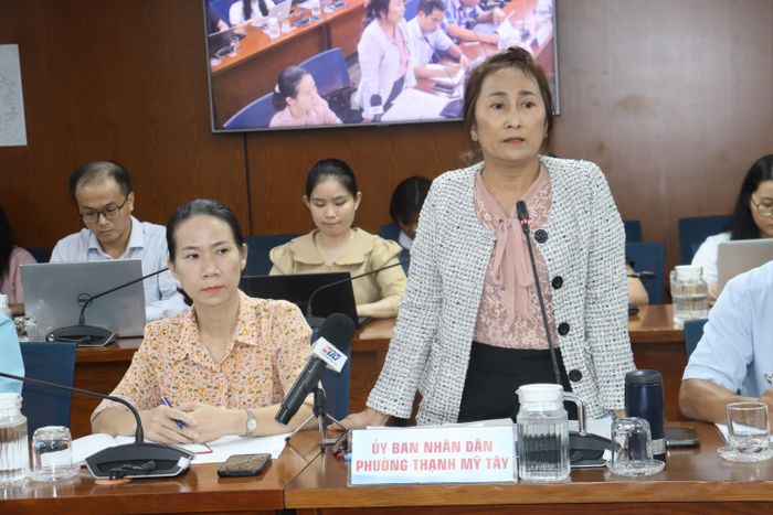  Bà Nguyễn Thị Châu Thi thông tin tại họp báo 