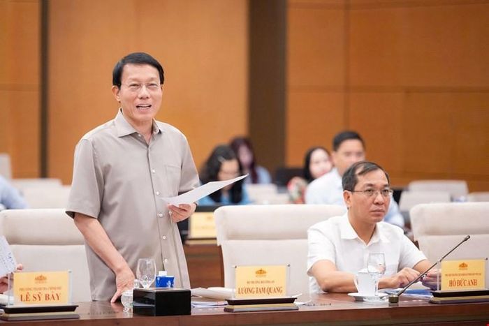 Đại tướng Lương Tam Quang, Bộ trưởng Bộ Công an báo cáo tại Phiên họp. Ảnh: Quốc hội.